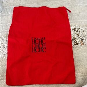 Carolina Herrera Red dust bag cover
